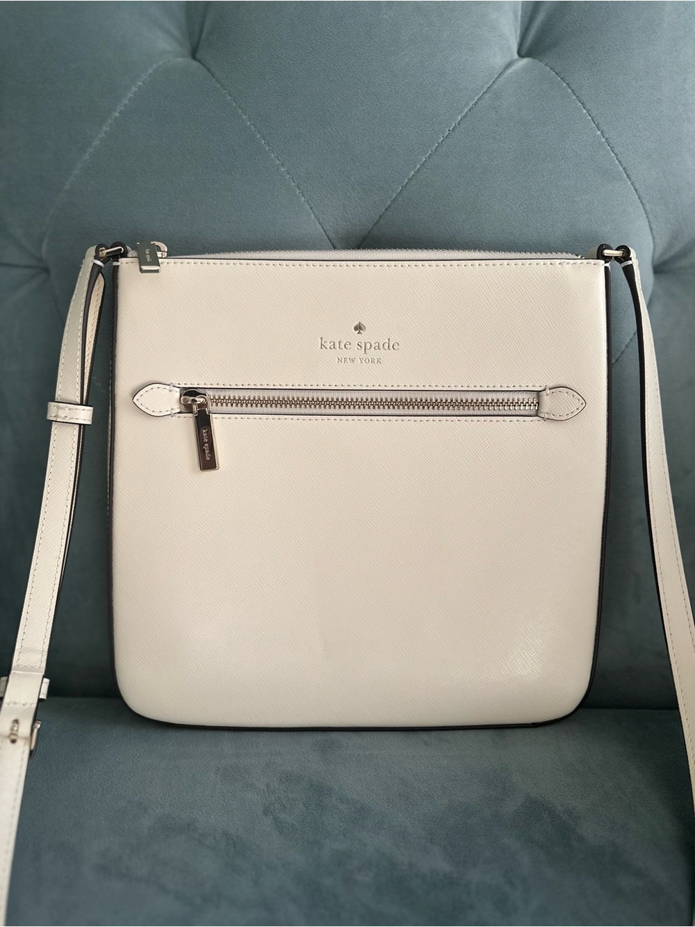 kate spade cream crossbody with front zip